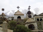 Old mining cemetery with the Huayna Potosi