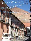 IllimOne of the many colonial streets with the view of Cerro Rico in the background, Potosi, Bolivia