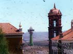View of the tower of the Society of Jesus church and Pari Orcko lookout tower in the background, Potosi, Bolivia