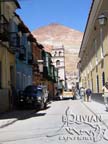 Tarija Street, with the tower of San Francisco church and Cerro Rico in the background, Potosi,  Bolivia