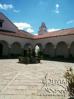 Patio of Casa de Libertad museum with the Cathedral bell tower in the background, Sucre, Chuquisaca, Bolivia
