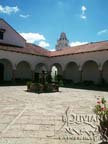 Central Patio of Casa de Libertad museum with the Cathedral bell tower in the background, Sucre, Chuquisaca, Bolivia
