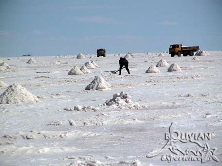 Manually harvesting salt from Salar de Uyuni, near the town of Colchani, Bolivia