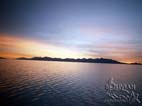 Sunset over Salar de Uyuni,  in summer time it is flooded with several inches of water, Salar de Uyuni, Potosi, Bolivia